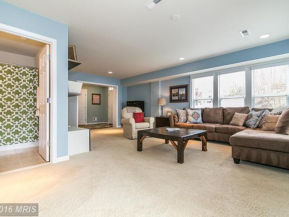 Entry level family room with full bathroom