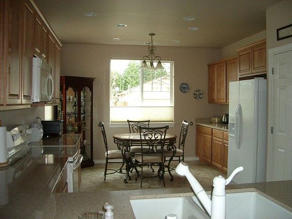 Charming kitchen with room for a table and maybe even your own island. Pantry space, refrigerator st