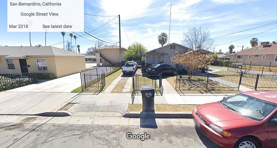 Street view showing private driveway and front door