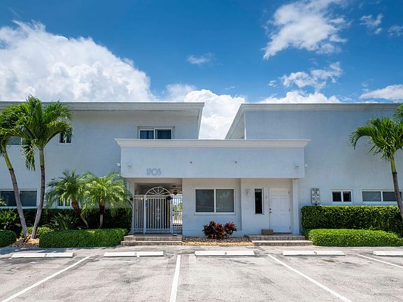 The building is modern, with ample assigned and guest parking.