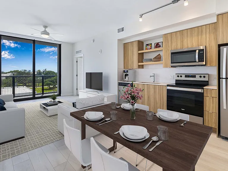 Your open floorplan has wood flooring throughout