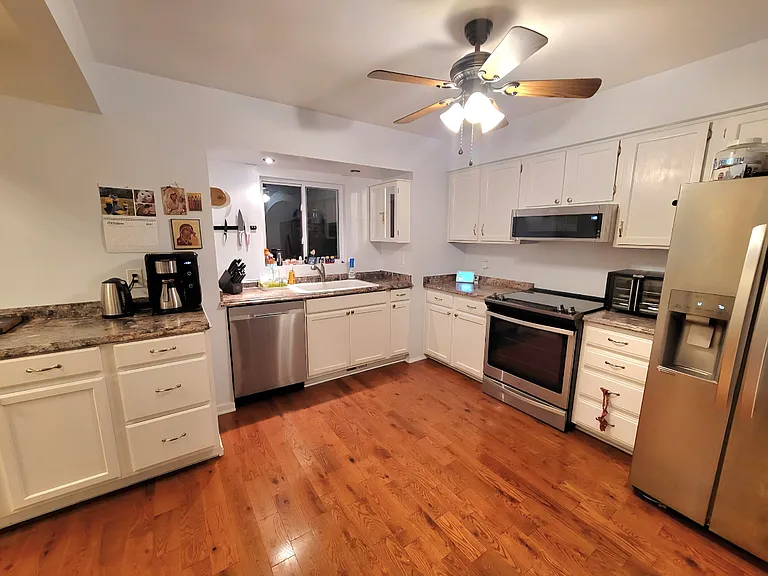 Kitchen with movable island/ counter
