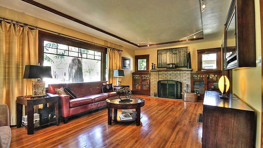 Living Room with Wood burning fireplace with gas starter