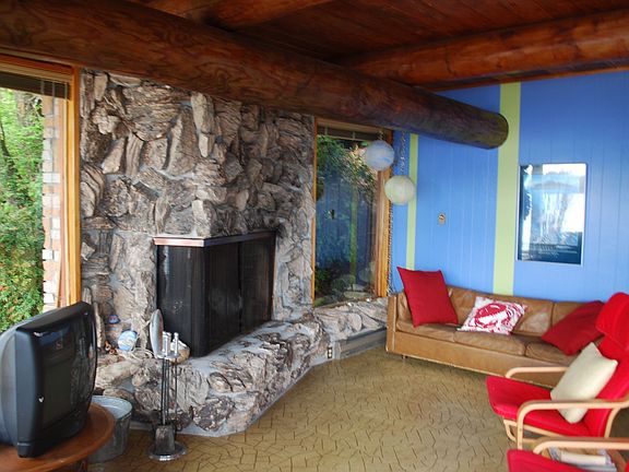 Stone Fireplace on both upper & main levels