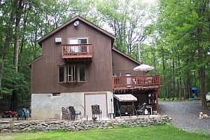 Back of House with Stone Wall