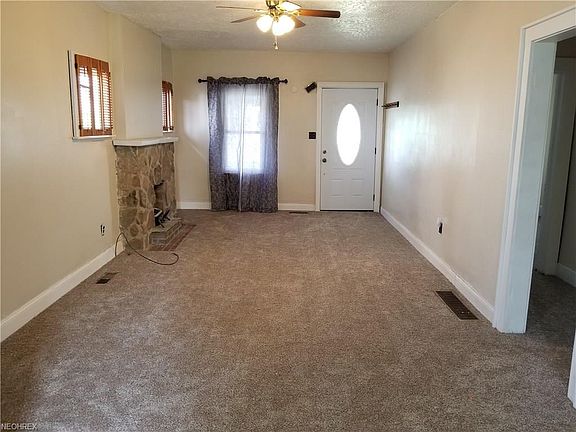 Living room with brand new carpet