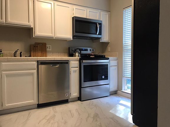 Kitchen: brand new flooring and appliances with convection oven