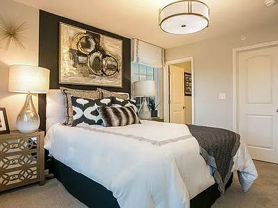 Bed room. Bed, Wall Decor and Lights are not actual. - 911 Charlton Ln