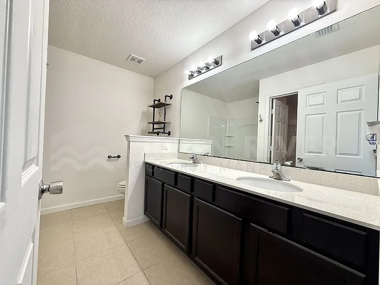 8704 Lake George Cir W — Photo 23