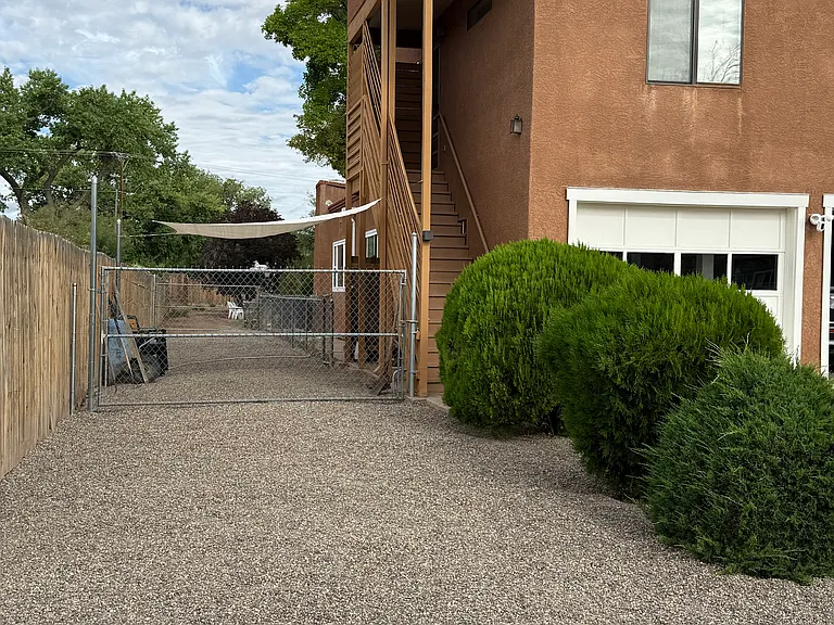Parking area is in front of the dog run.