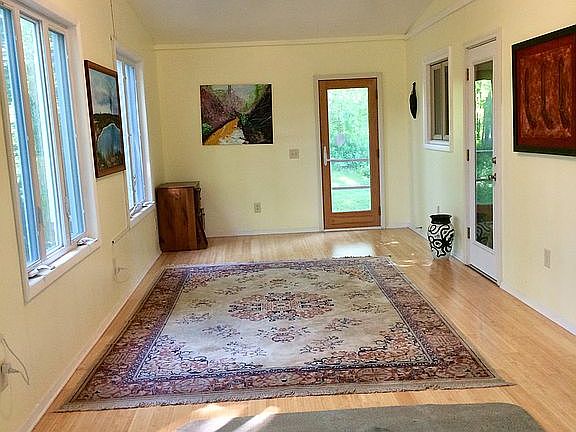 Sun porch over garage.
