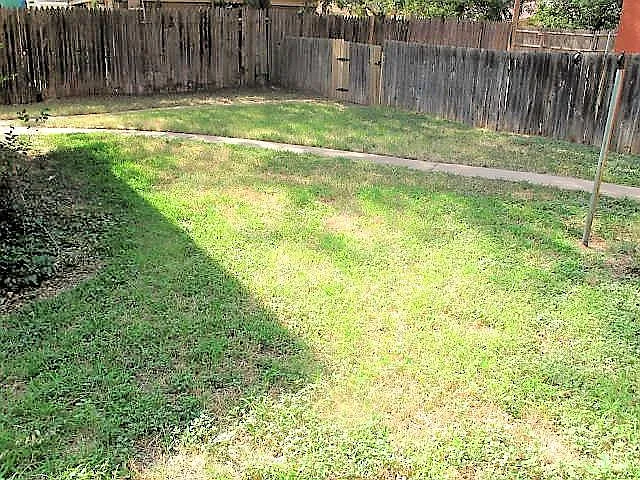 Large fenced backyard