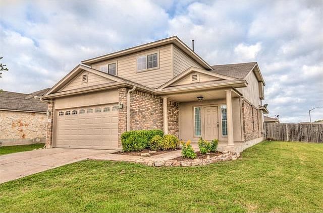 Beautiful four bedroom home on a large corner lot in the wonderful Benbrook Ranch community!