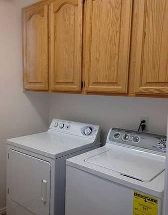 Separate Laundry room located at garage entry