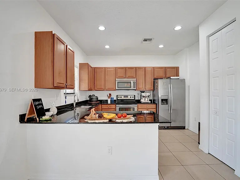 650 NE 191st Ter — Photo 31