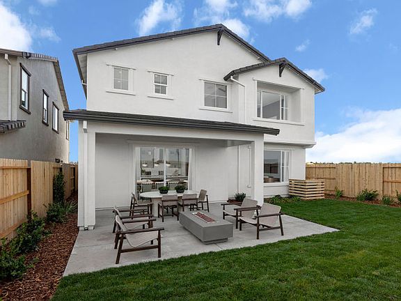 Backyard with covered patio area