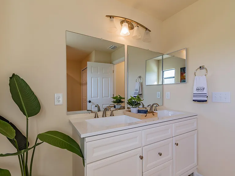 Digitally staged Primary Bathroom