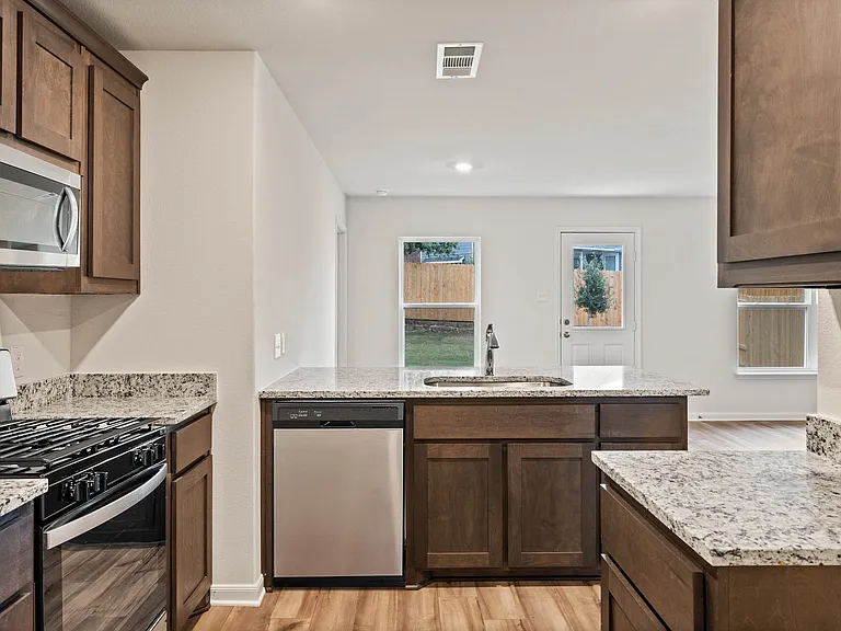 The kitchen has energy-efficient appliances.