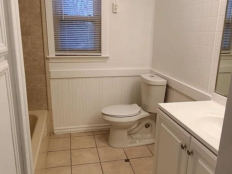 Full bath with linen closet.