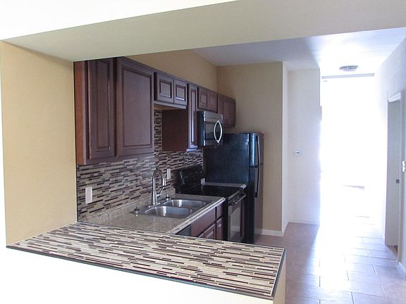 3rd image of 3946 Tholozan Ave