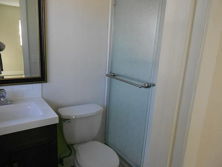 Bathroom to Bedroom One