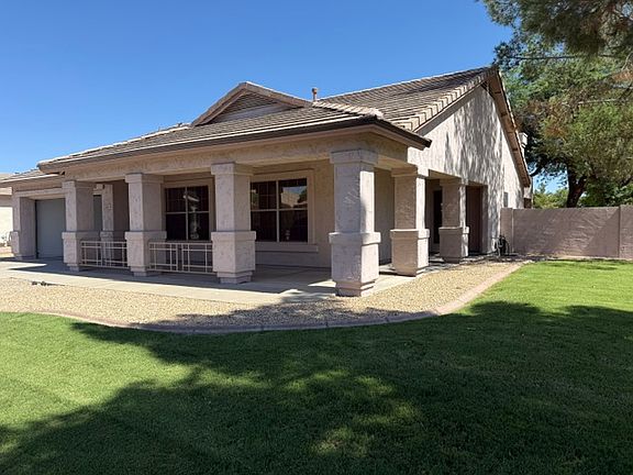 Large Corner lot with a lush grassy area in front yard