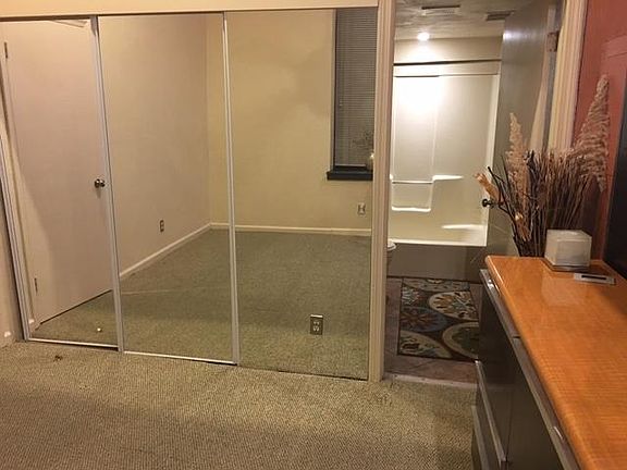 This view is in the bedroom showing the double mirror closet