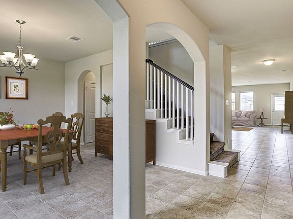 Dining room tucked off foyer