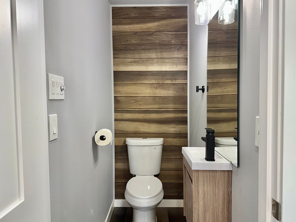 Half bathroom on the same floor as living room and kitchen