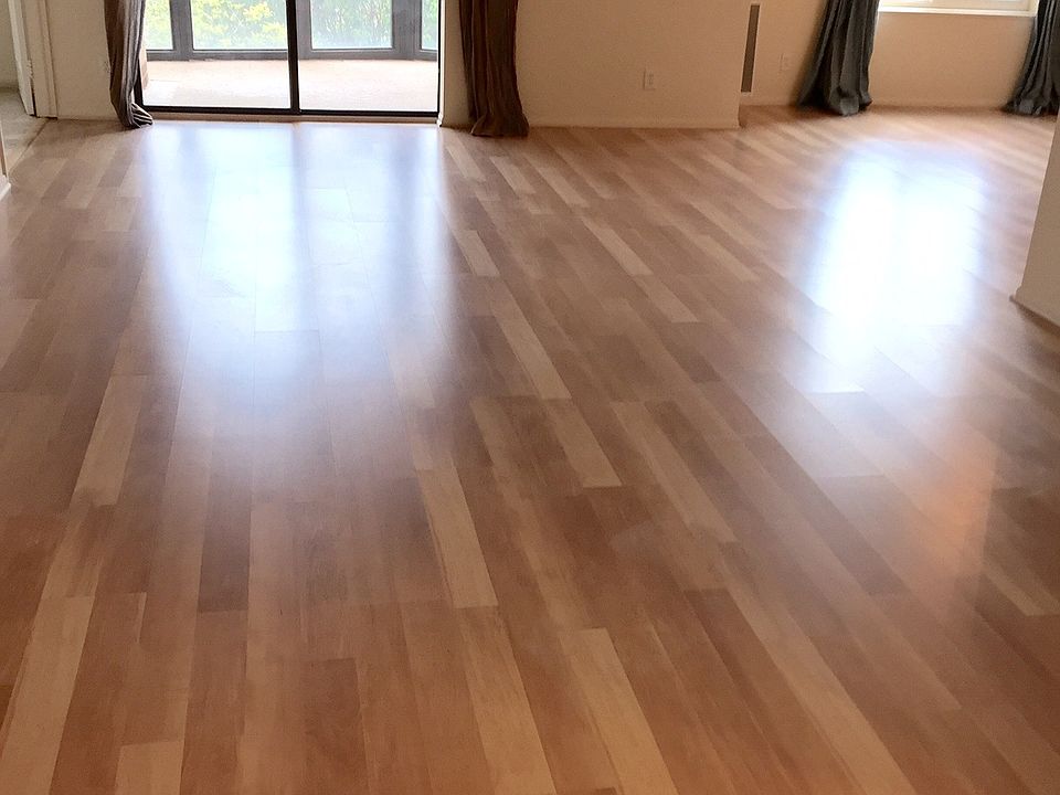 view of living room to sunroom sliding glass dorrs