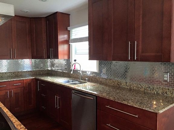 Metal mosaic tile backsplash
