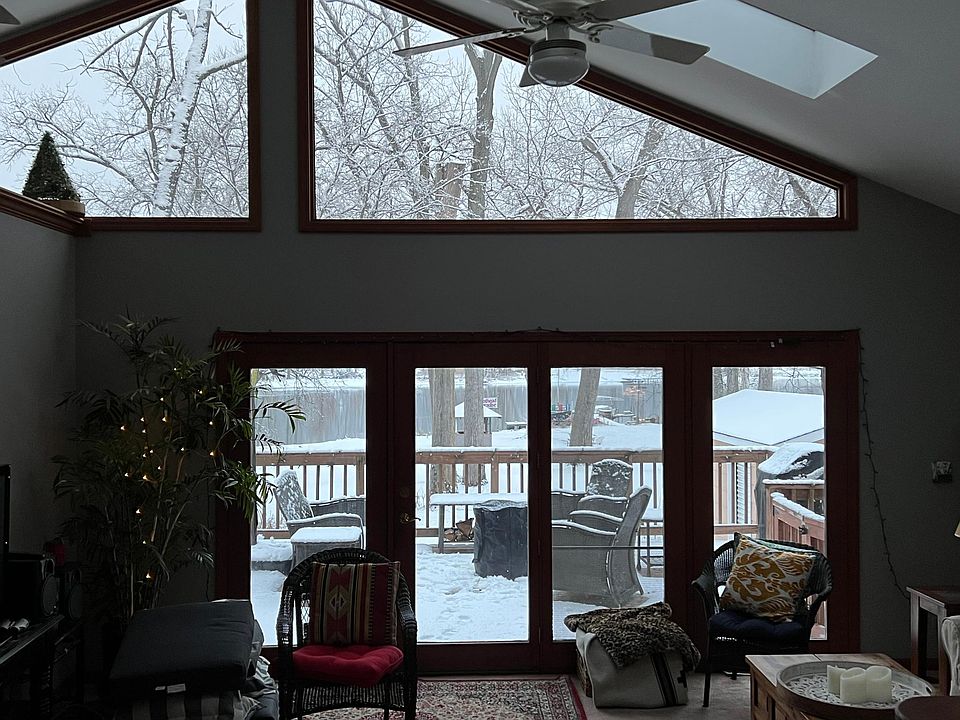 spacious living room lots of natural light, beautiful anytime of year