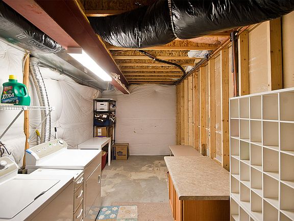 Unfinished Basement/Laundry Area