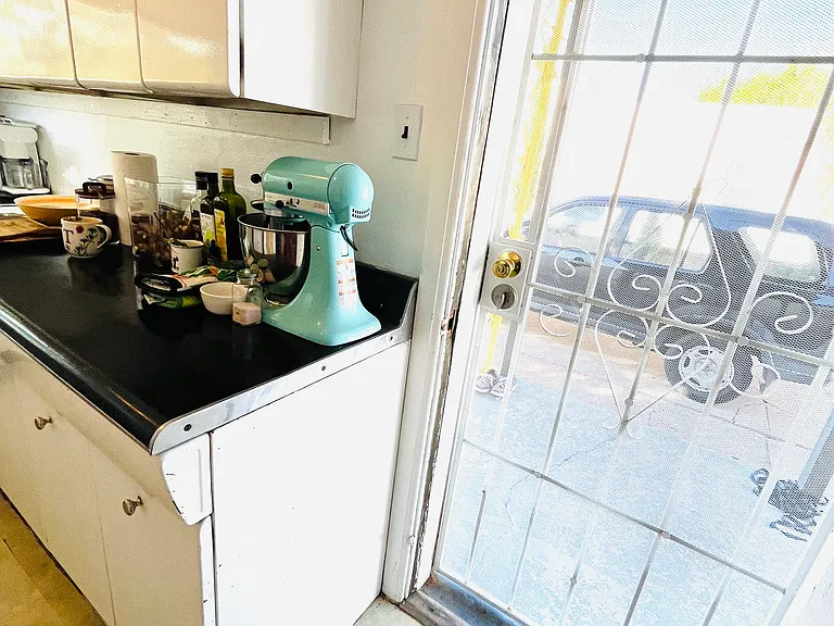 This is the second entrance that faces the driveway, and leads in to the kitchen. Very easy access to your vehicle if parked on the driveway.