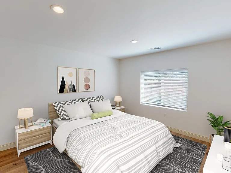 Bedroom 1. This image shows a virtually furnished space. Bedrooms come unfurnished.