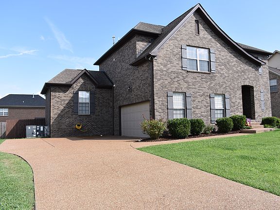 2-car side garage w/ oversize driveway