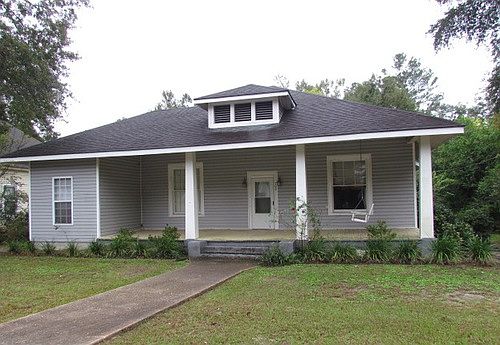 Front of house, large lawn.