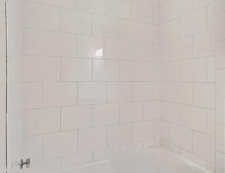 Elevate your lifestyle at Central Lakes of Uptown. This elegant bathroom features modern finishes and a soothing atmosphere, perfect for relaxation. Schedule your tour today to see all that this vibrant community has to offer!