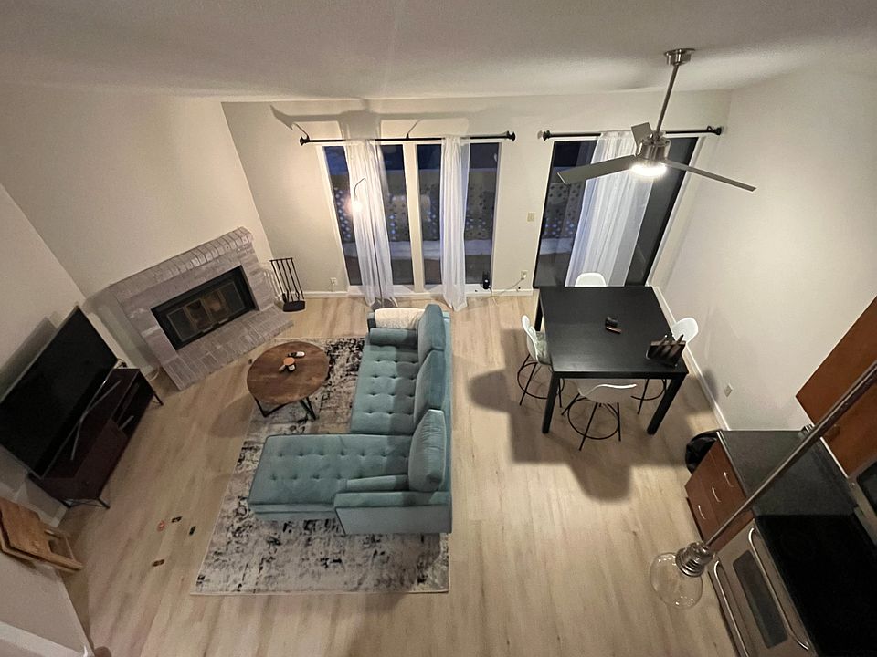 view of open floor plan from loft