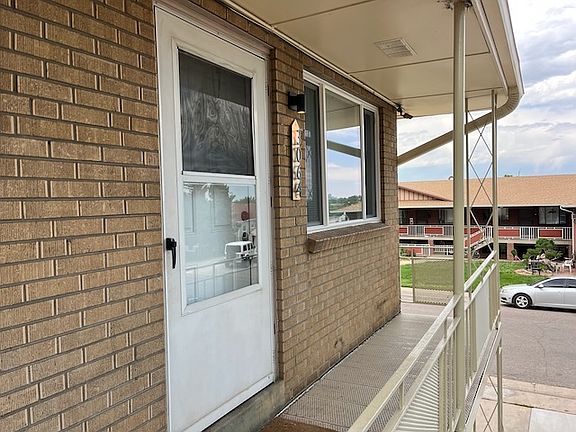 New security front door, exterior light and unit number