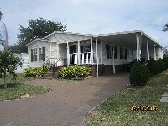 front with carport view