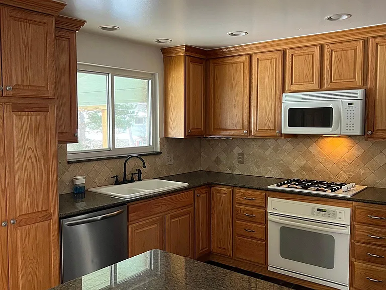 1058 E Davies Ave — Photo 4