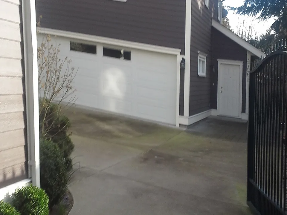 Front door, parking stall. 2 car garage not used. Storage space for owner so no disruptive noise.