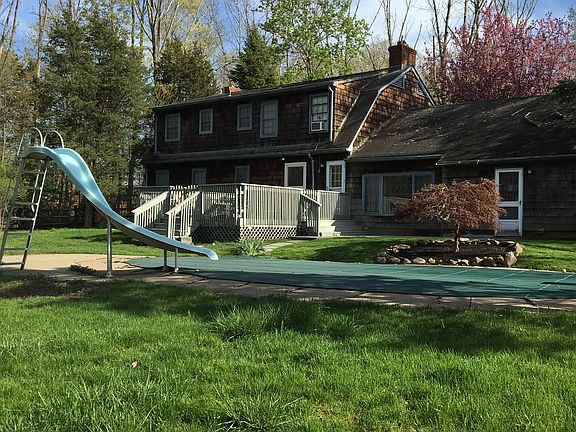 Spacious fenced backyard with pool