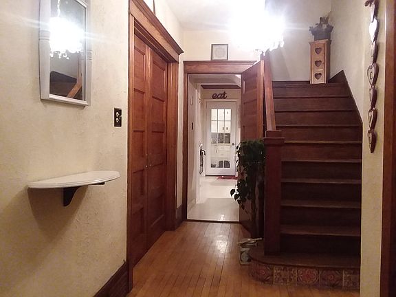 Entry with hide-a-way doors.