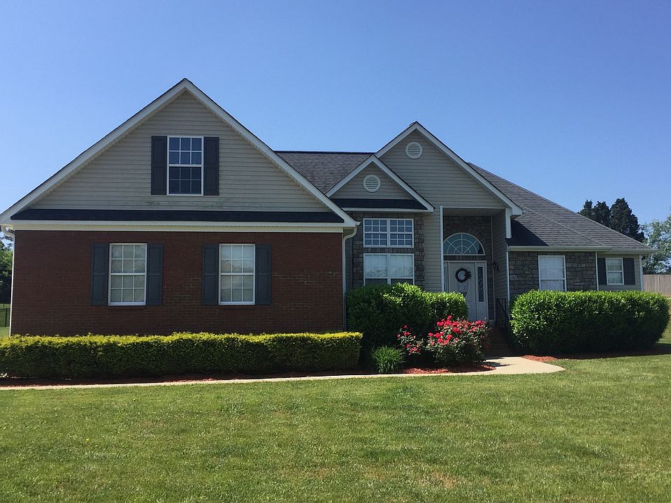 Front view with huge lot!
