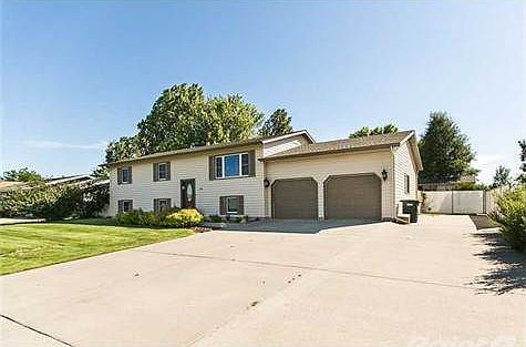 Front of house with extra RV parking available