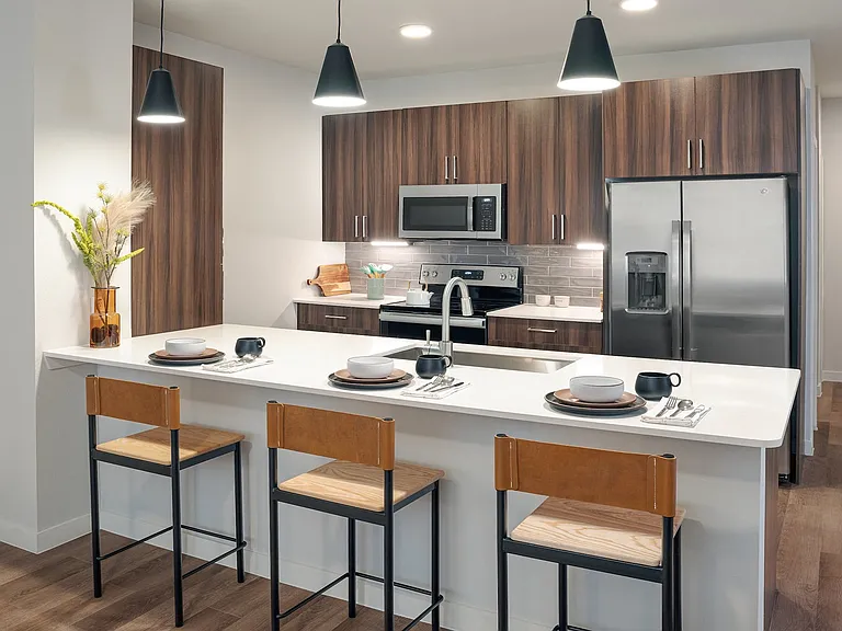 Our chef-inspired kitchens feature designer finishes and stainless steel appliances