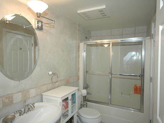 Master Bath has been updated -- shower/tub combo with tile!