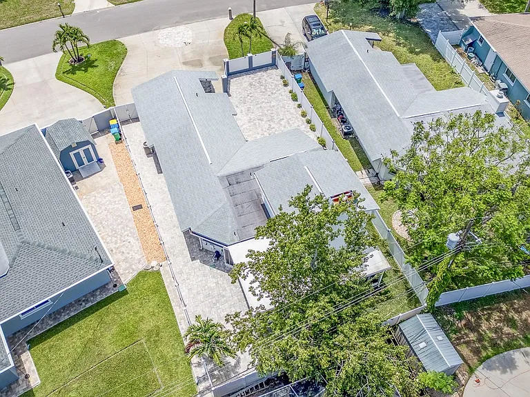 TONS of new brick pavers surround the house and make it easy to maintain.